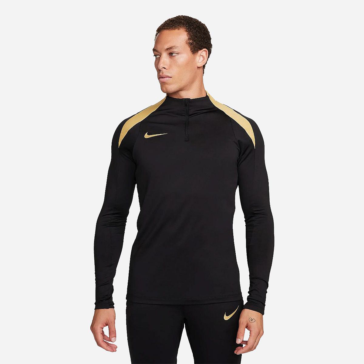 Nike tracksuit black and gold hot sale
